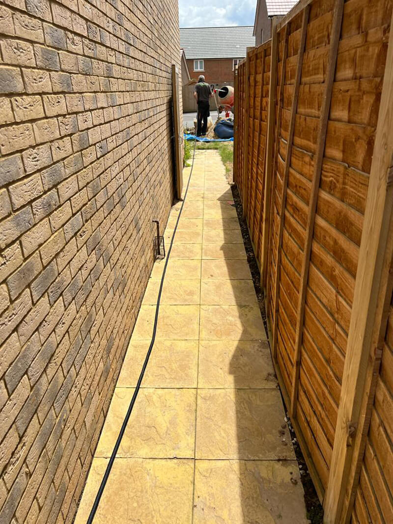 Indian Sandstone With Black Paving Edges and New Turf - Canterbury, Kent