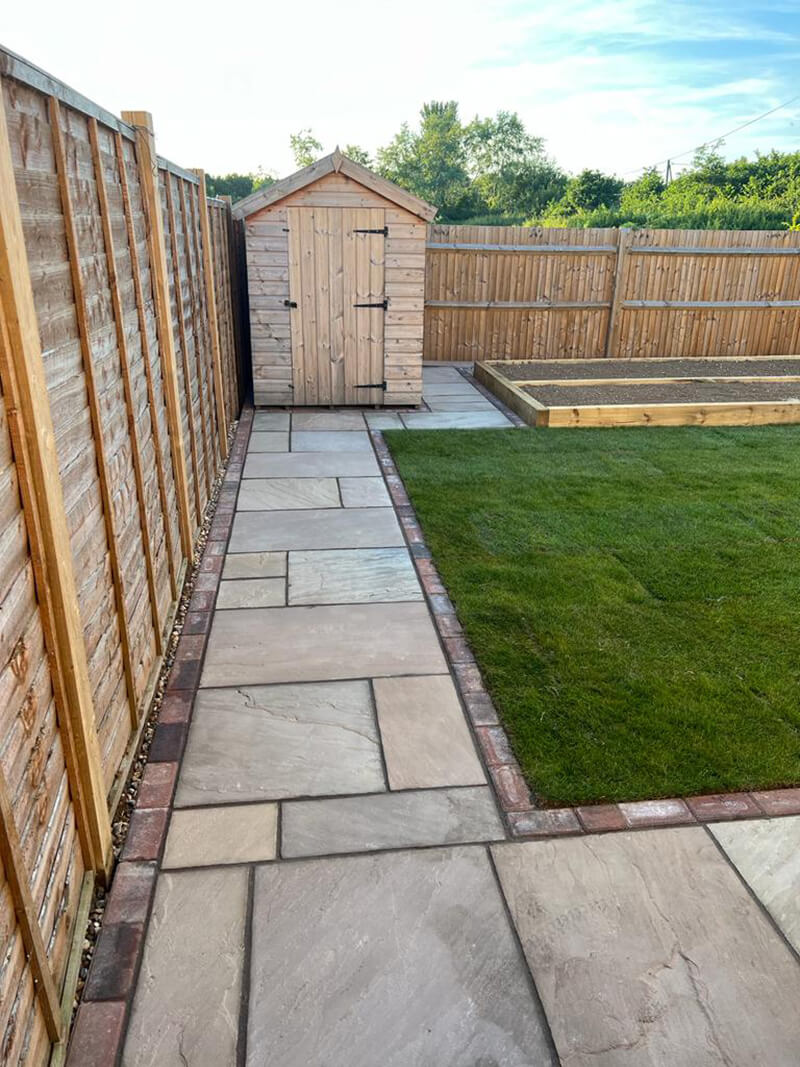 Indian Sandstone With Black Paving Edges and New Turf - Canterbury, Kent