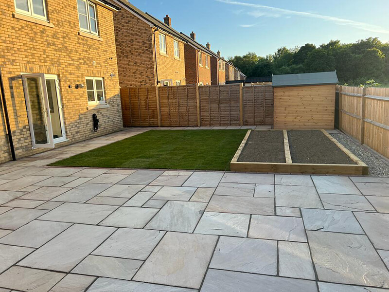 Indian Sandstone With Black Paving Edges and New Turf - Canterbury, Kent
