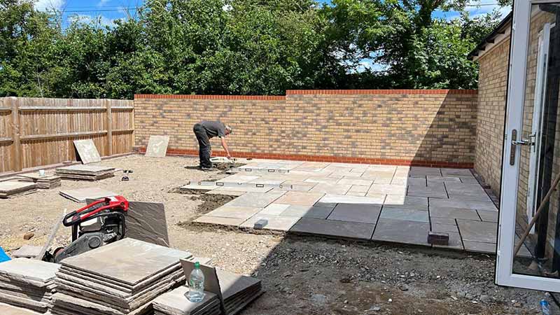 Indian Sandstone With Black Paving Edges and New Turf - Canterbury, Kent