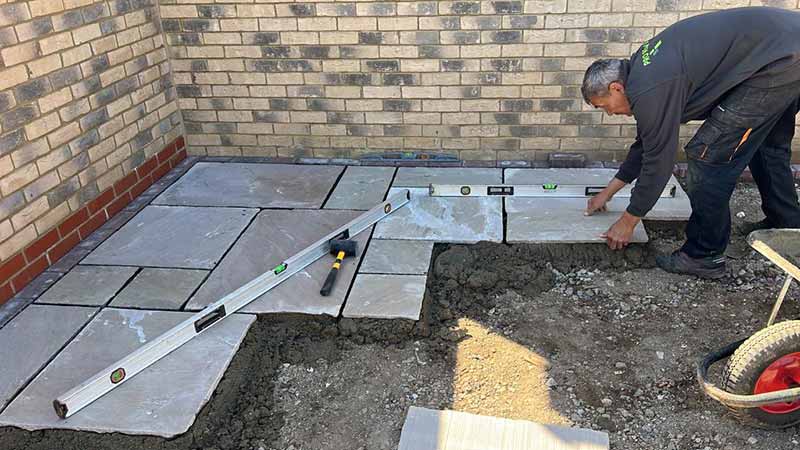 Indian Sandstone With Black Paving Edges and New Turf - Canterbury, Kent