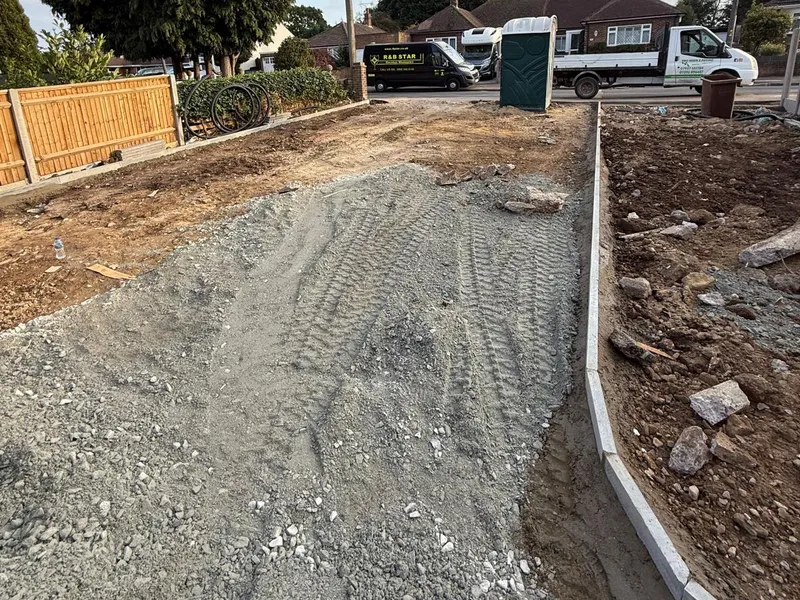Compacted sub base and kerb edging laid before the block paving begins, Kent
