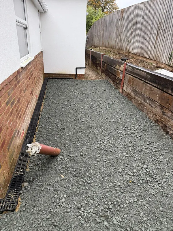 Compacted sub base and drainage laid along the side of the property, Kent