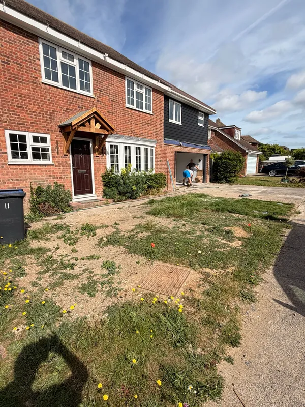 Overgrown front garden and worn driveway before the resin bound installation, Kent