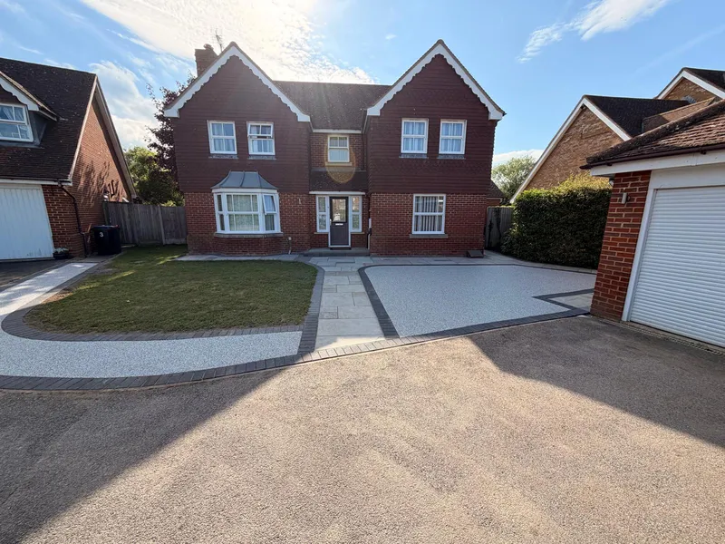 Tired gravel driveway at a large detached house before resurfacing, Kent