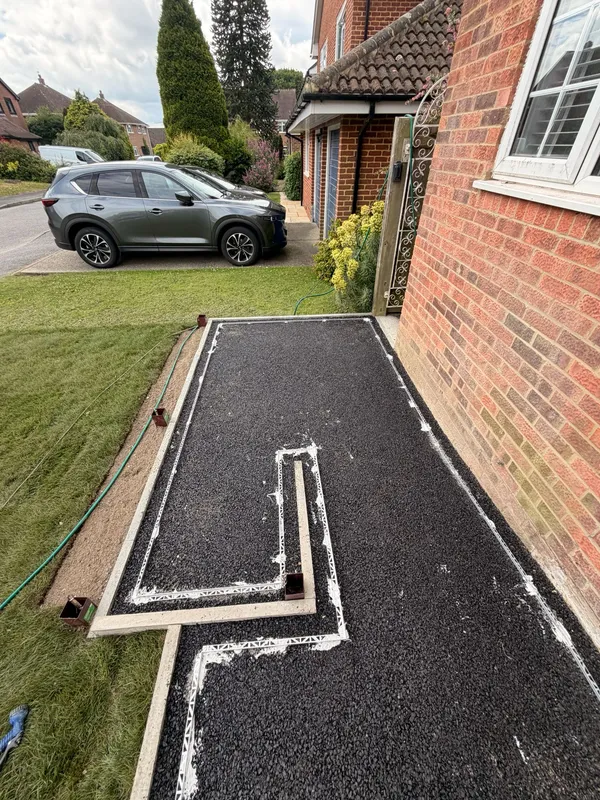 Tarmac base with marked edging ready to receive the resin bound surface, Kent