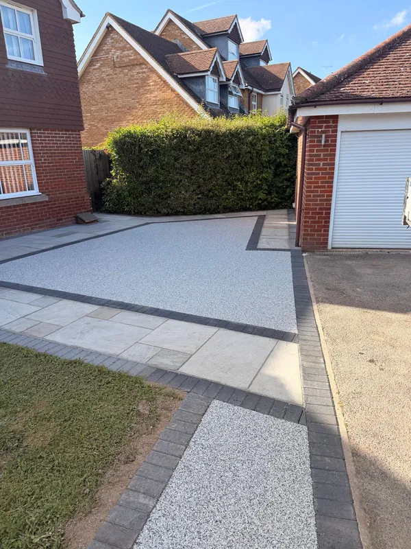 Resin bound driveway sweeping up to the garage doors, Kent